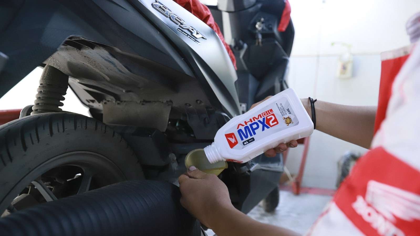 AHM OIL tipe SPX2 dan MPX, Pelumas Skutik Honda Makin Hemat dan Tepat